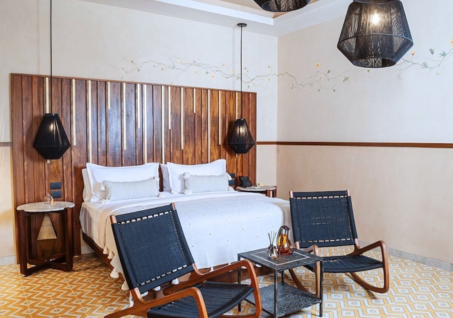 Imagen de la habitación del Hotel Adoro Boutique. Foto 13