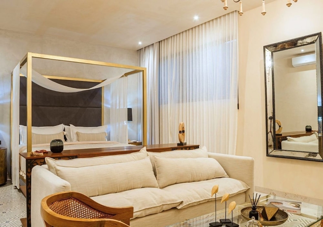Imagen de la habitación del Hotel Adoro Boutique. Foto 15