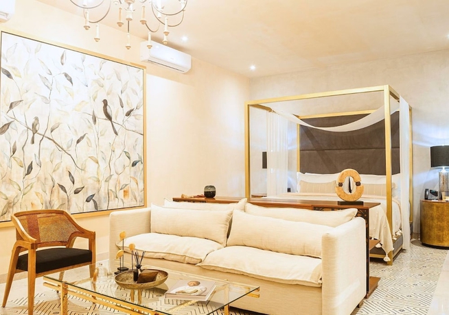 Imagen de la habitación del Hotel Adoro Boutique. Foto 16