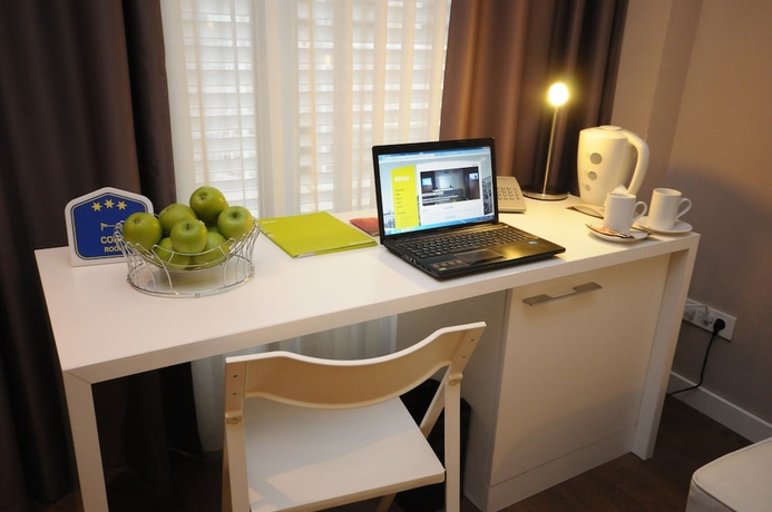 Imagen de la habitación del Hotel Adresa Suites. Foto 5