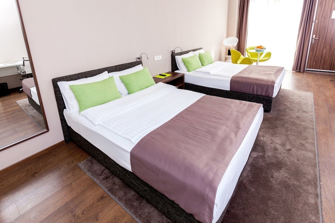 Imagen de la habitación del Hotel Adresa Suites. Foto 6