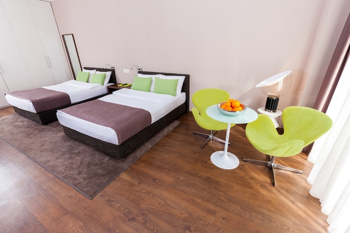 Imagen de la habitación del Hotel Adresa Suites. Foto 8