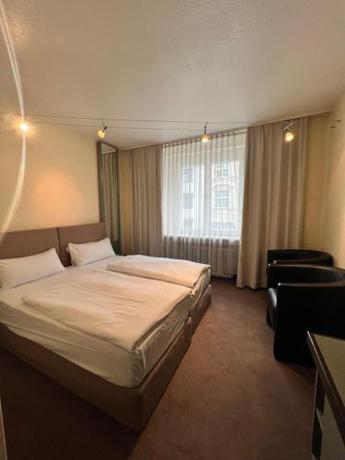 Imagen de la habitación del Hotel Adrett K&ouml;nigsallee, Dusseldorf. Foto 16