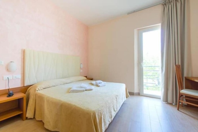 Imagen de la habitación del Hotel Adria Nuova. Foto 7