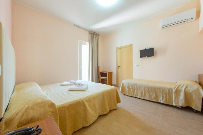 Imagen de la habitación del Hotel Adria Nuova. Foto 10