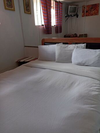 Imagen de la habitación del Hotel Adrianos Hostel. Foto 11