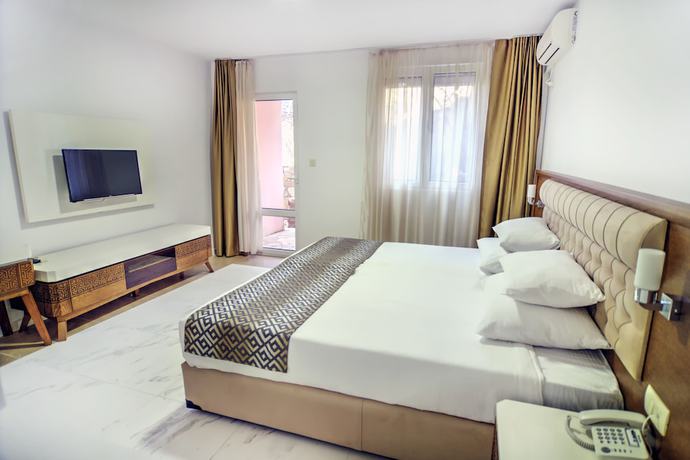 Imagen de la habitación del Hotel Adrovic Sveti Stefan. Foto 17
