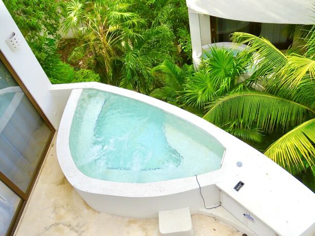 Imagen de la habitación del Hotel Adults only Resort in Tulum. Foto 16