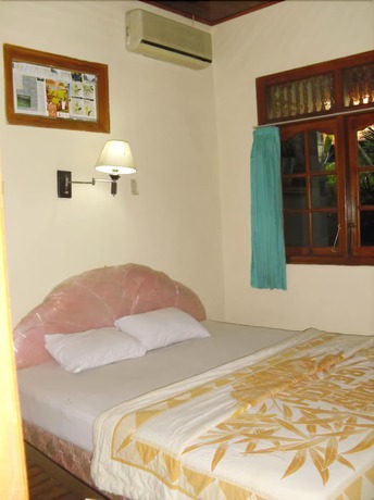 Imagen de la habitación del Hotel Adus Beach Inn. Foto 19