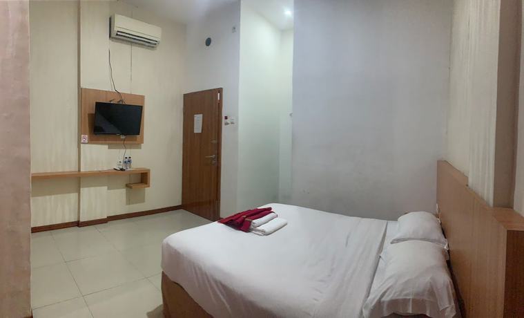 Imagen de la habitación del Hotel Aedo Syariah. Foto 7