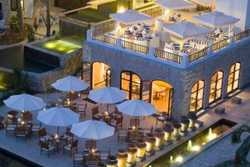 Imagen del bar/restaurante del Hotel Aegean Boutique Suites Resort Sanya. Foto 3
