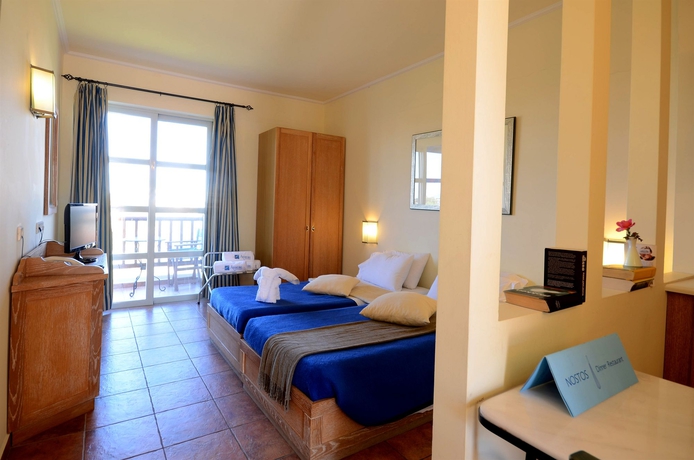 Imagen de la habitación del Hotel Aegean Houses. Foto 7