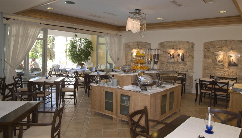 Imagen del bar/restaurante del Hotel Aegean Houses. Foto 3