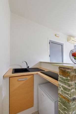 Imagen de la habitación del Hotel Aegean Paradiso Vacation Club. Foto 11