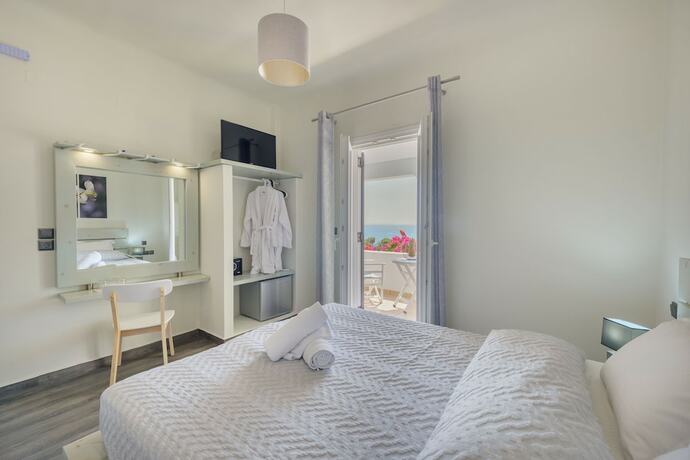 Imagen de la habitación del Hotel Aegean Paradiso Vacation Club. Foto 15