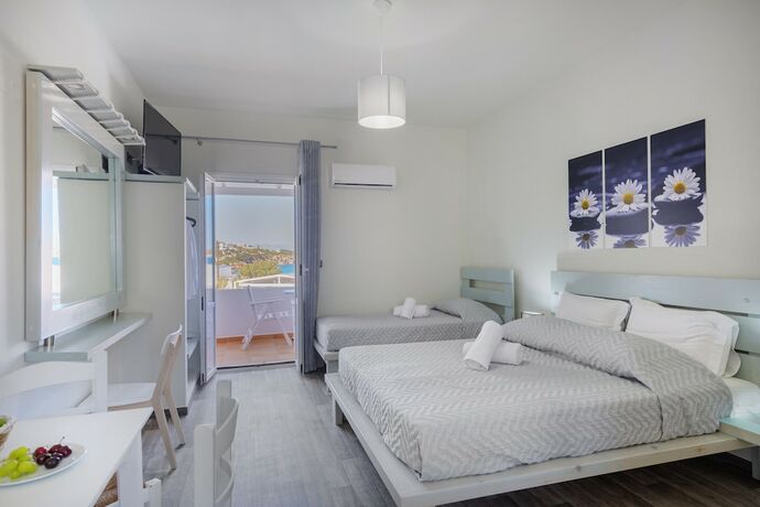 Imagen de la habitación del Hotel Aegean Paradiso Vacation Club. Foto 20