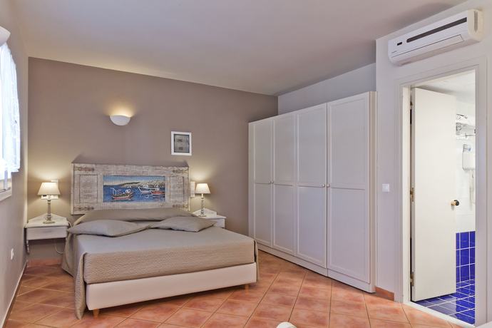 Imagen de la habitación del Hotel Aegean Village Beachfront Resort. Foto 6