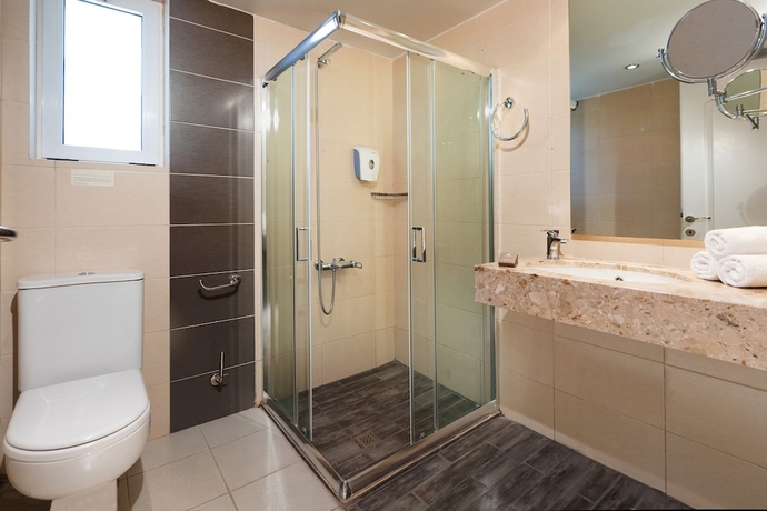 Imagen de la habitación del Hotel Aeolian Village Beach Resort. Foto 13