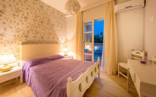 Imagen de la habitación del Hotel Aeolos Boutique & Suites. Foto 8