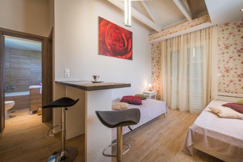Imagen de la habitación del Hotel Aeolos Boutique & Suites. Foto 9