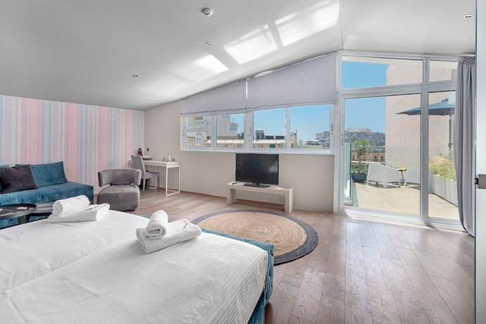 Imagen de la habitación del Hotel Aeolos Luxury Suites. Foto 2