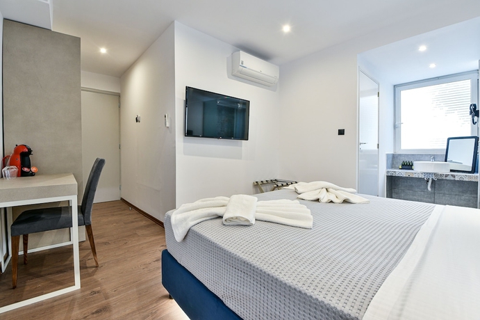 Imagen de la habitación del Hotel Aeolos Luxury Suites. Foto 7