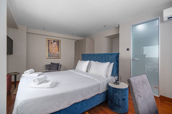 Imagen de la habitación del Hotel Aeolos Luxury Suites. Foto 9