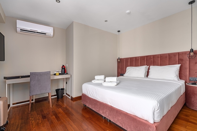 Imagen de la habitación del Hotel Aeolos Luxury Suites. Foto 11