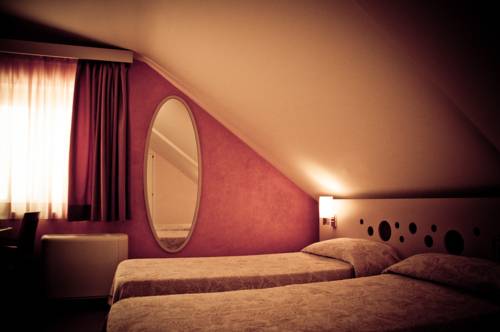 Imagen de la habitación del Hotel Aerhotel Phelipe. Foto 11