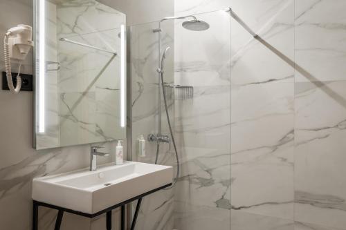 Imagen de la habitación del Hotel Aerohotel Barcelona Airport 24h. Foto 16