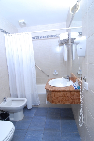 Imagen de la habitación del Hotel Aeroparque Inn And Suites. Foto 3