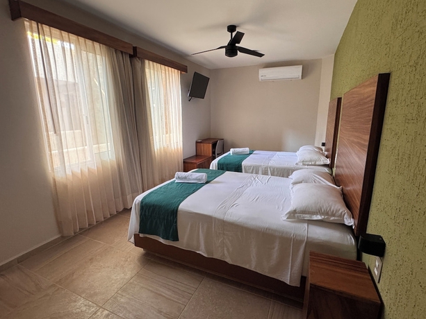 Imagen de la habitación del Hotel Aeropuerto Express. Foto 2