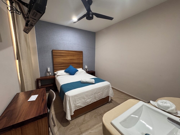 Imagen de la habitación del Hotel Aeropuerto Express. Foto 13