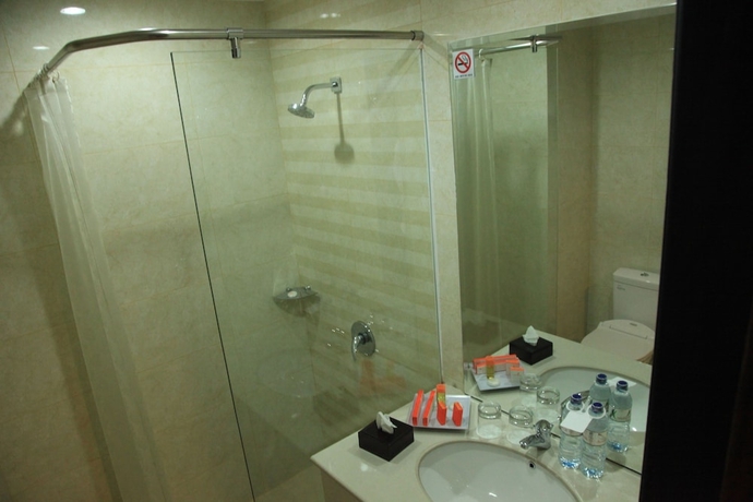 Imagen de la habitación del Hotel Aerotel Smile Makassar. Foto 5