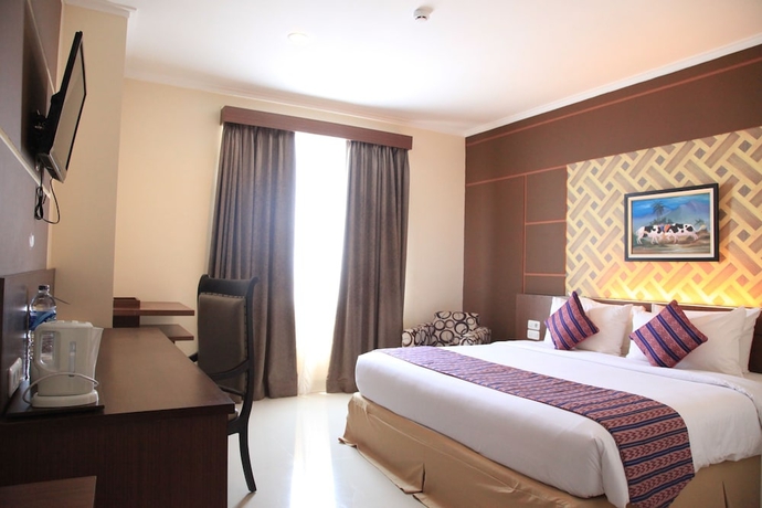 Imagen de la habitación del Hotel Aerotel Smile Makassar. Foto 6