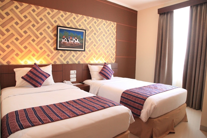 Imagen de la habitación del Hotel Aerotel Smile Makassar. Foto 8