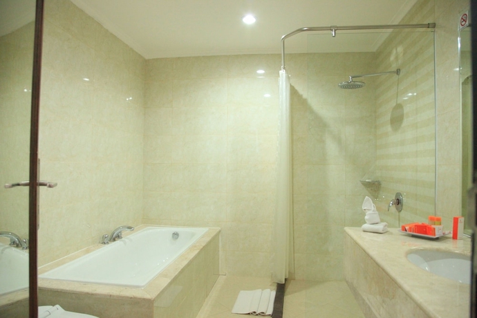 Imagen de la habitación del Hotel Aerotel Smile Makassar. Foto 10