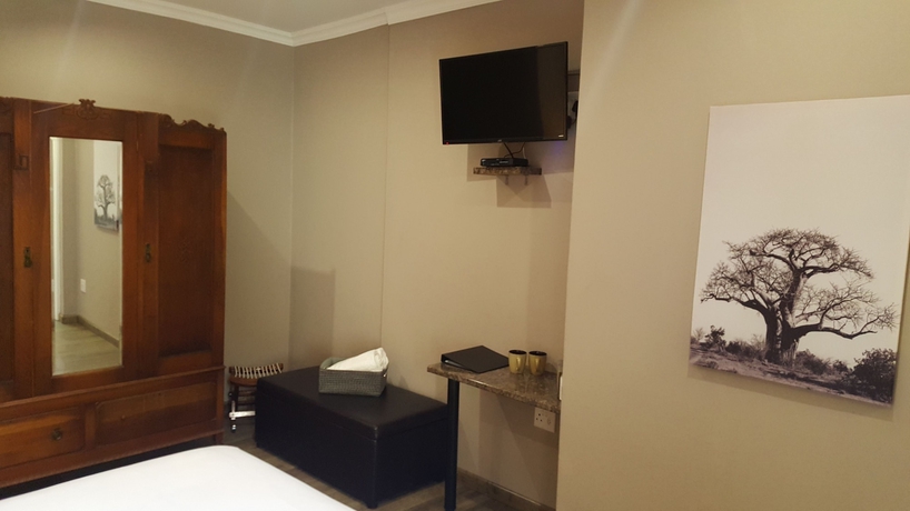 Imagen de la habitación del Hotel Aerotropolis Guest Lodge. Foto 10