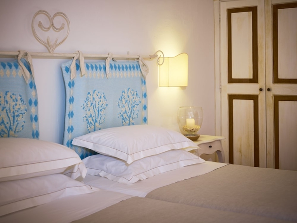 Imagen de la habitación del Hotel Aethos Sardinia. Foto 4