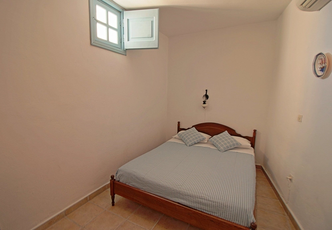 Imagen de la habitación del Hotel Aethrio Sunset Village - Oia. Foto 12