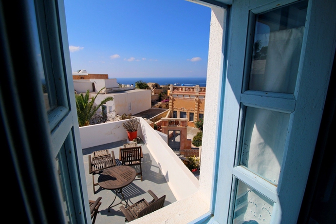 Imagen de la habitación del Hotel Aethrio Sunset Village - Oia. Foto 13