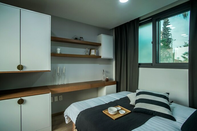 Imagen de la habitación del Hotel Aewol Bada Town House. Foto 31