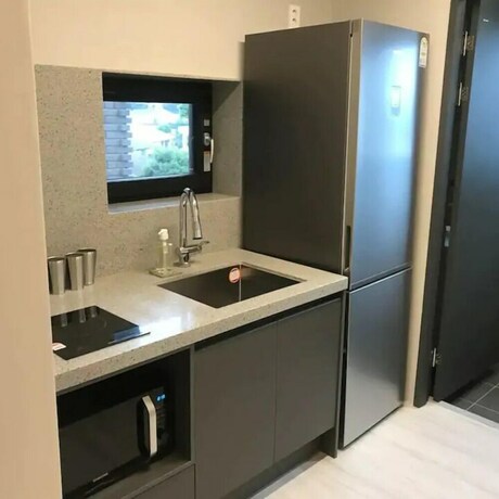 Imagen de la habitación del Hotel Aewol Brick House. Foto 16
