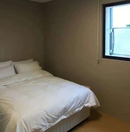 Imagen de la habitación del Hotel Aewol Brick House. Foto 35