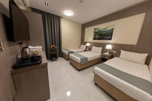 Imagen de la habitación del Hotel Afaq Al Iman. Foto 3