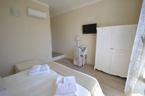 Imagen de la habitación del Hotel Affittacamere Casa Dane'. Foto 9