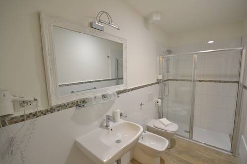 Imagen de la habitación del Hotel Affittacamere Casa Dane'. Foto 12