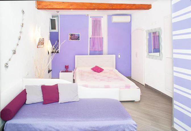 Imagen de la habitación del Hotel Affittacamere I Coralli. Foto 4