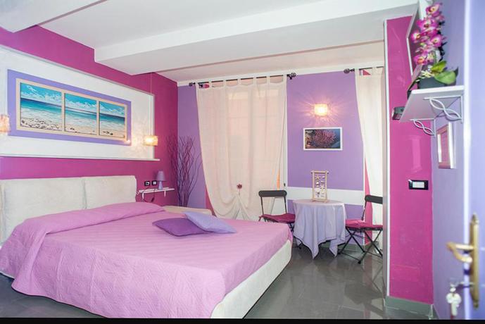 Imagen de la habitación del Hotel Affittacamere I Coralli. Foto 5