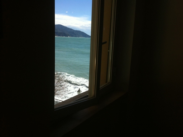 Imagen de la habitación del Hotel Affittacamere Lo Scoglio. Foto 4